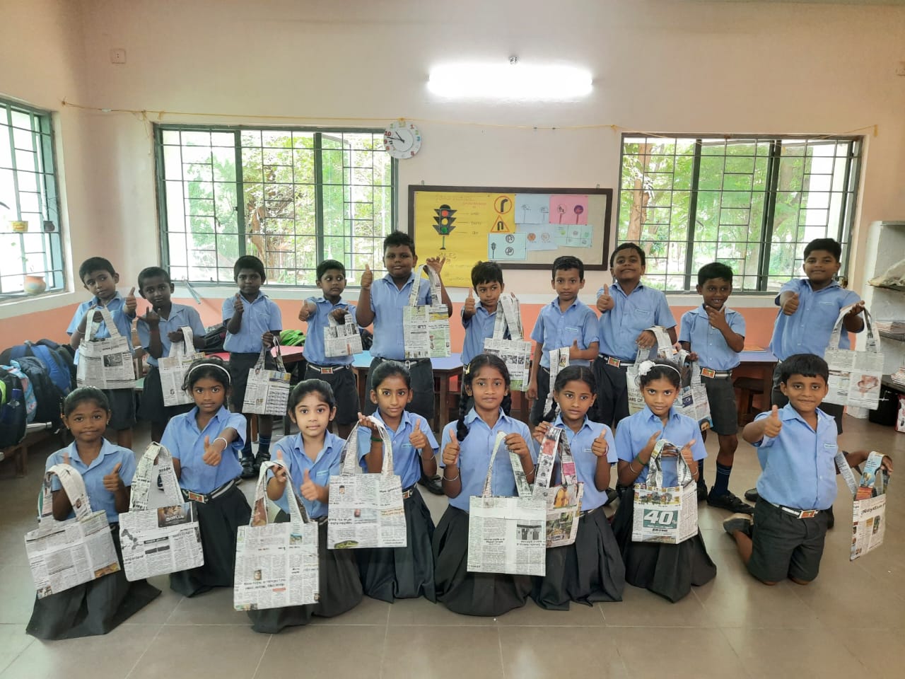 Children with creative crafts and paper bag making